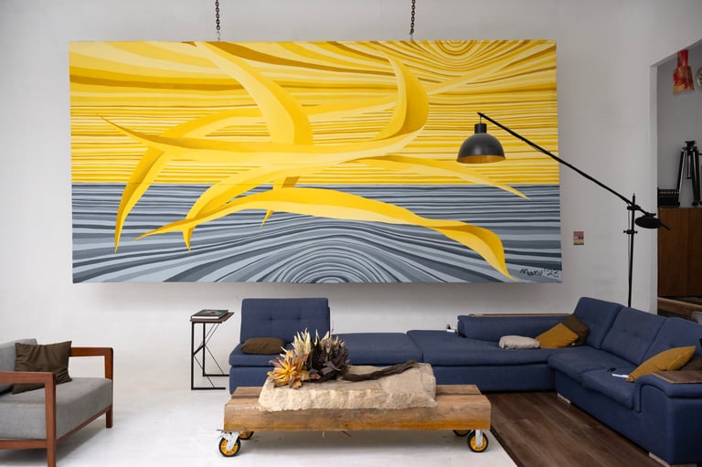 Modern living room with blue sectional sofa, wooden coffee table, and large yellow and gray abstract artwork on wall